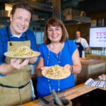 Alessandra Bellini, chief customer officer at Tesco featured here with Jamie Oliver
