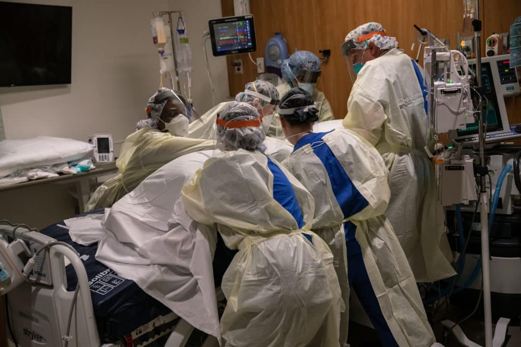 Medical professionals treating coronavirus patient