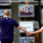 People looking at new houses