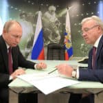 Alexander Uss with Putin