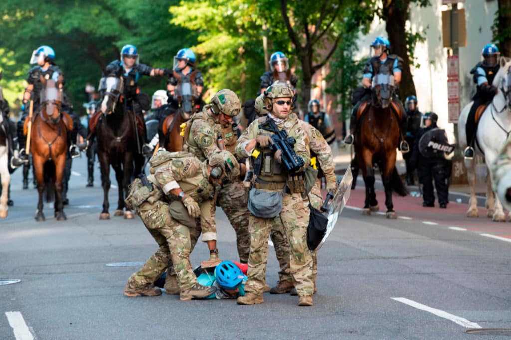 Trump threatens to send in military to end protests