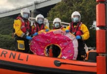 Teenagers on inflatable doughnut rescued from sea